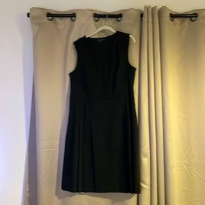 Never been worn classic black Brooks Brothers dress (size 14).